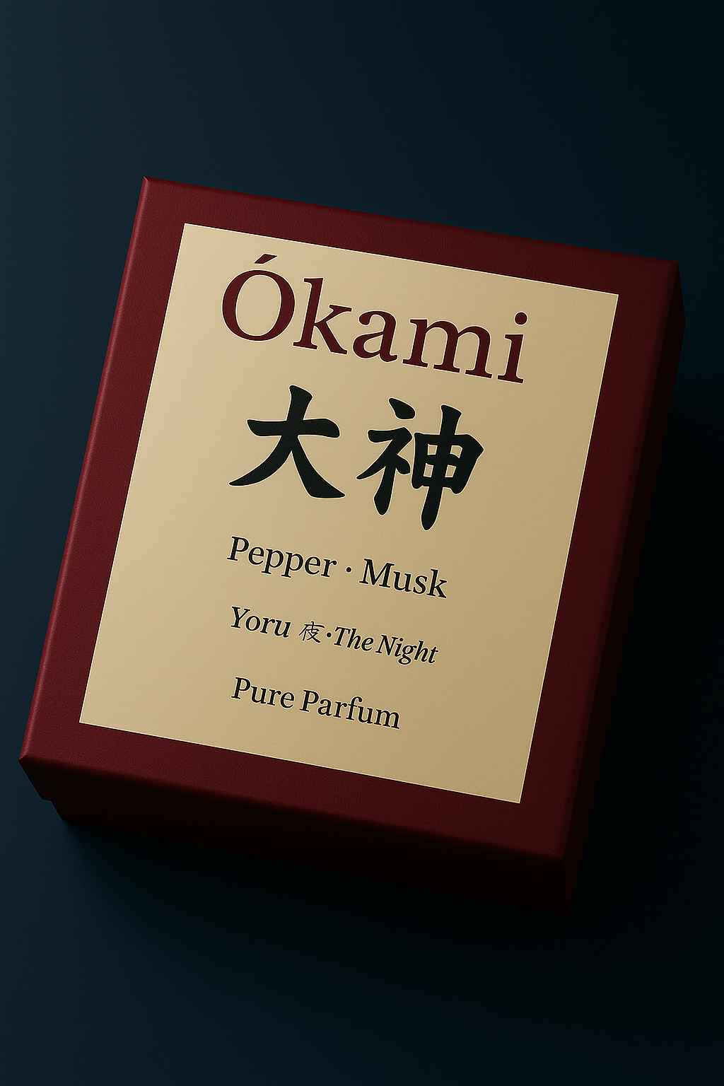 Box of Ókami Pure Parfum with maroon border and beige label on a dark background